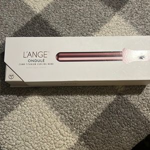 L’ange. Brand new.